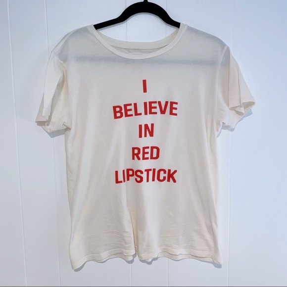 white graphic tee with red writing